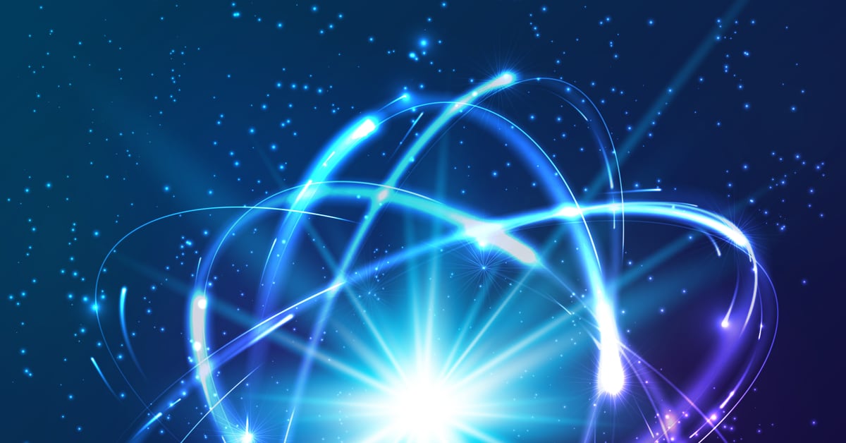 Leuchtendes Atommodell als Symbol für Sternenstaub und Materie
